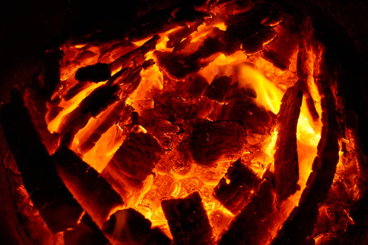 a close up of a fire in a fireplace