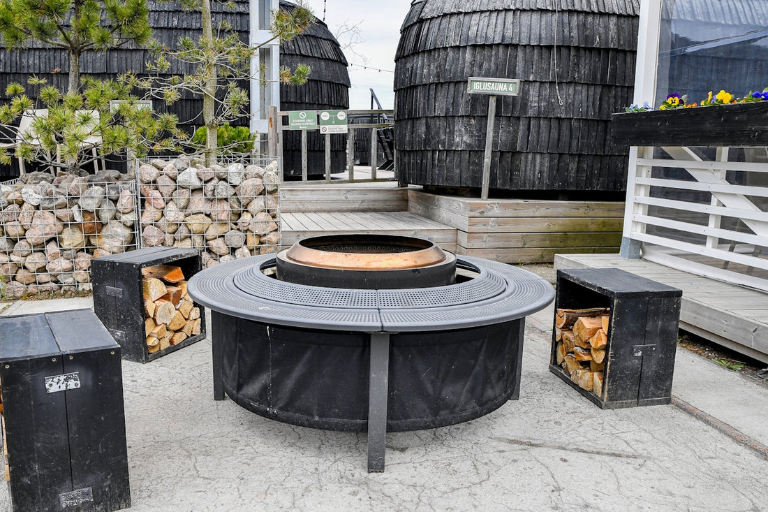 Modern outdoor fire pit with seating and firewood